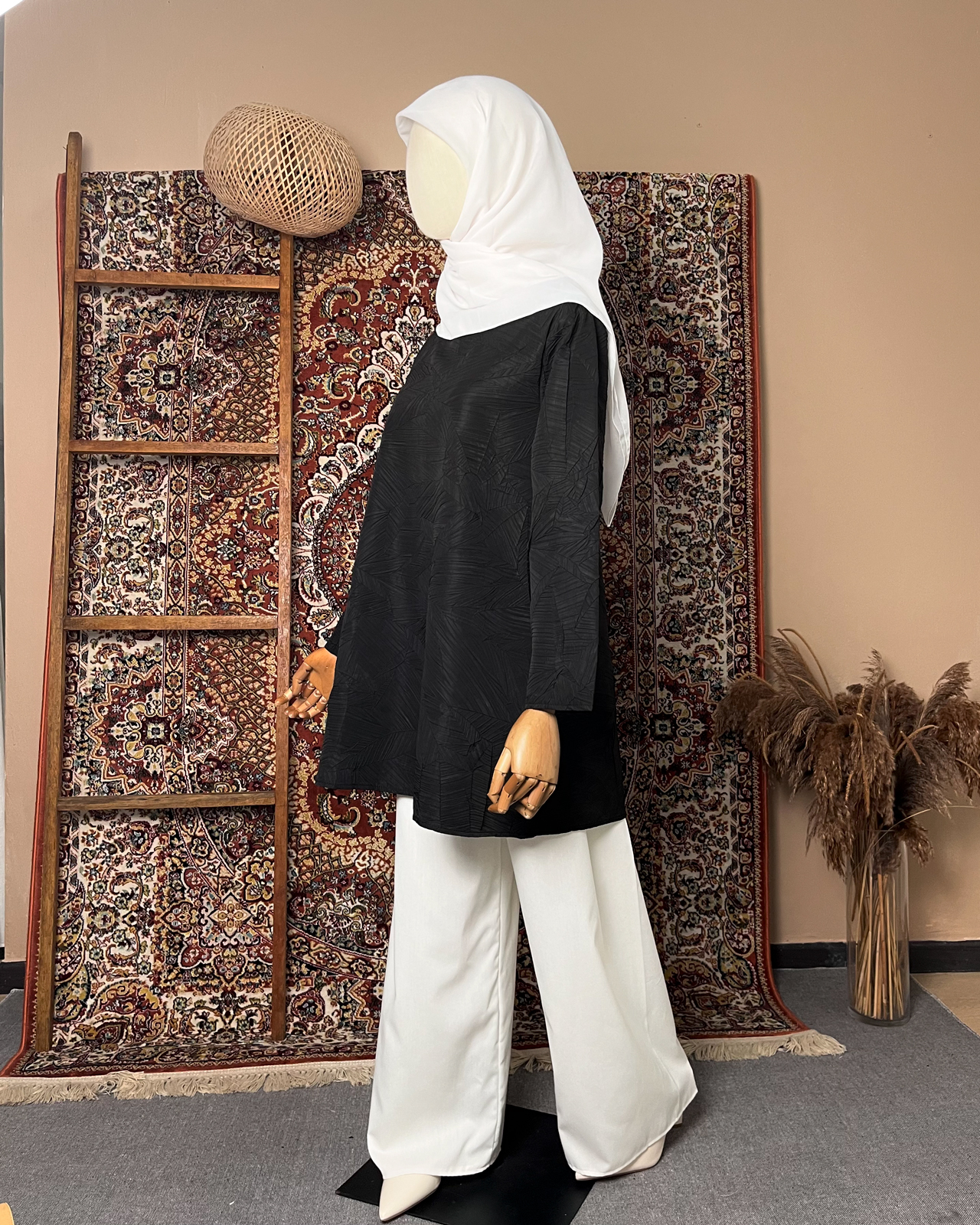 Tiara Ironless Tops in Jet Black